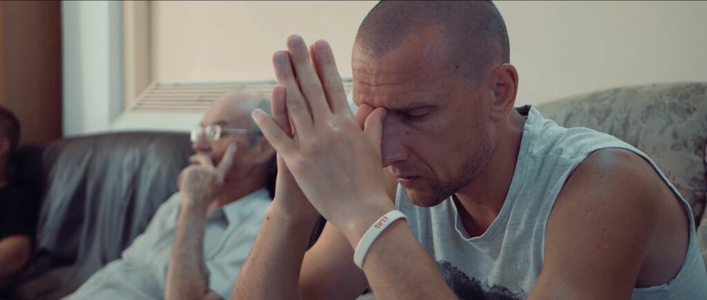 Man praying in Living Israel restoration home